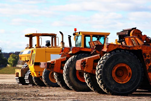 Yellow construction trucks