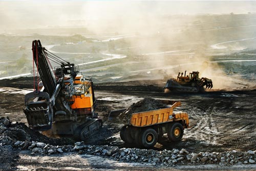 Construction trucks in mining area